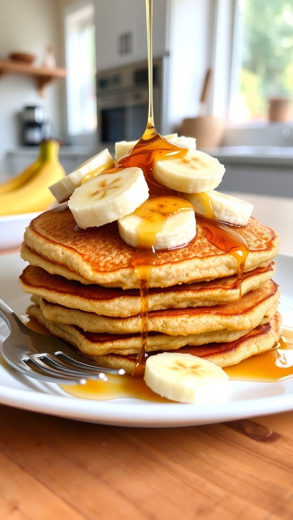 A stack of banana oat pancakes topped with banana slices and maple syrup on a white plate.